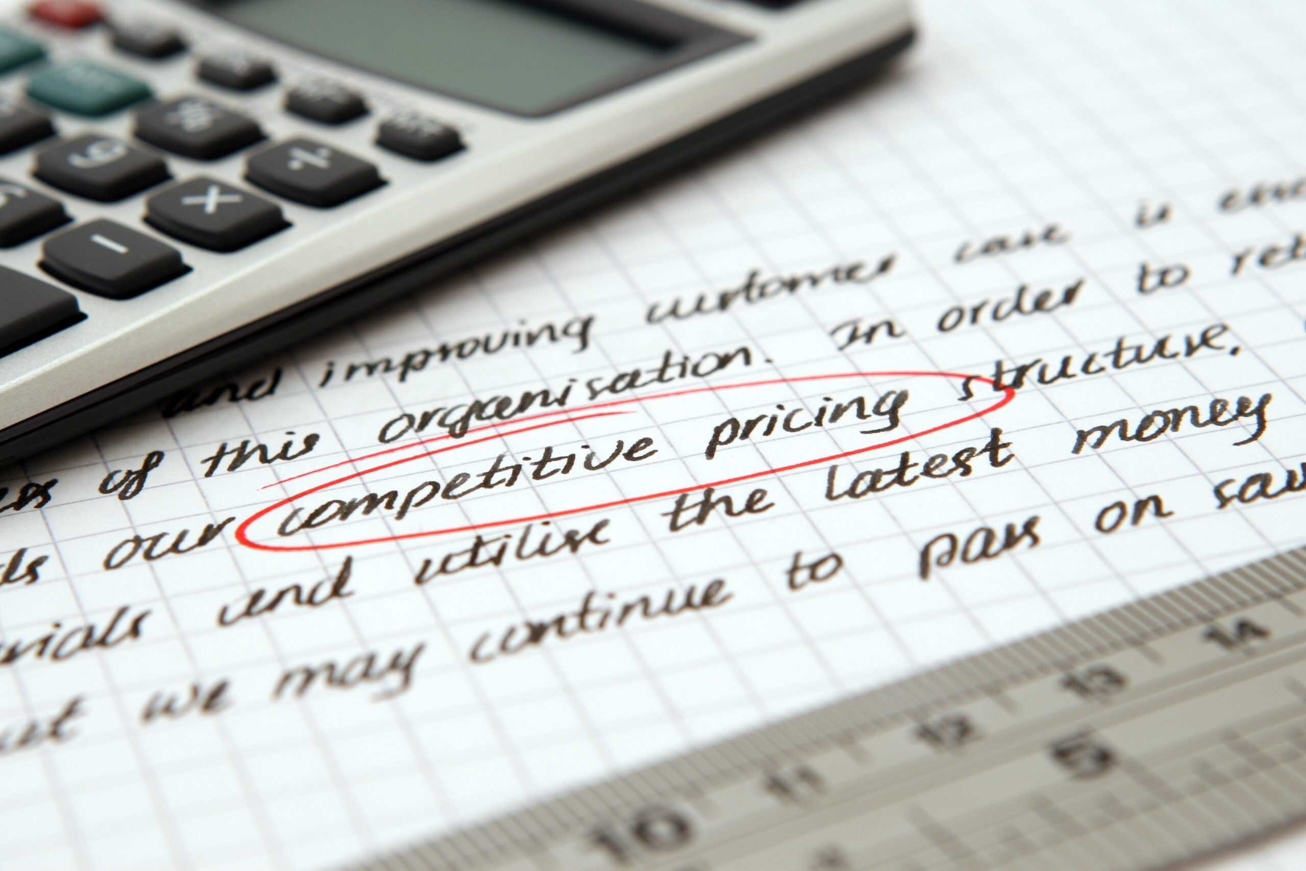 Business coach calculating how to price coaching services using costs, capacity, and margin