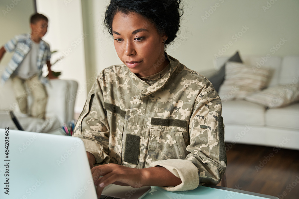 Women Veteran at computer
