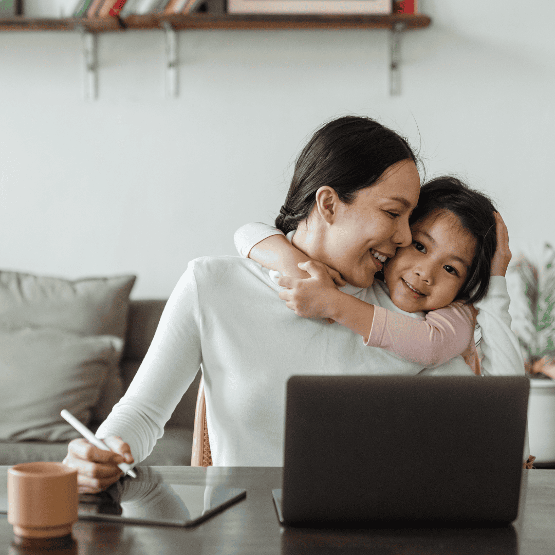 Woman entrepreneur managing work-life balance from home office