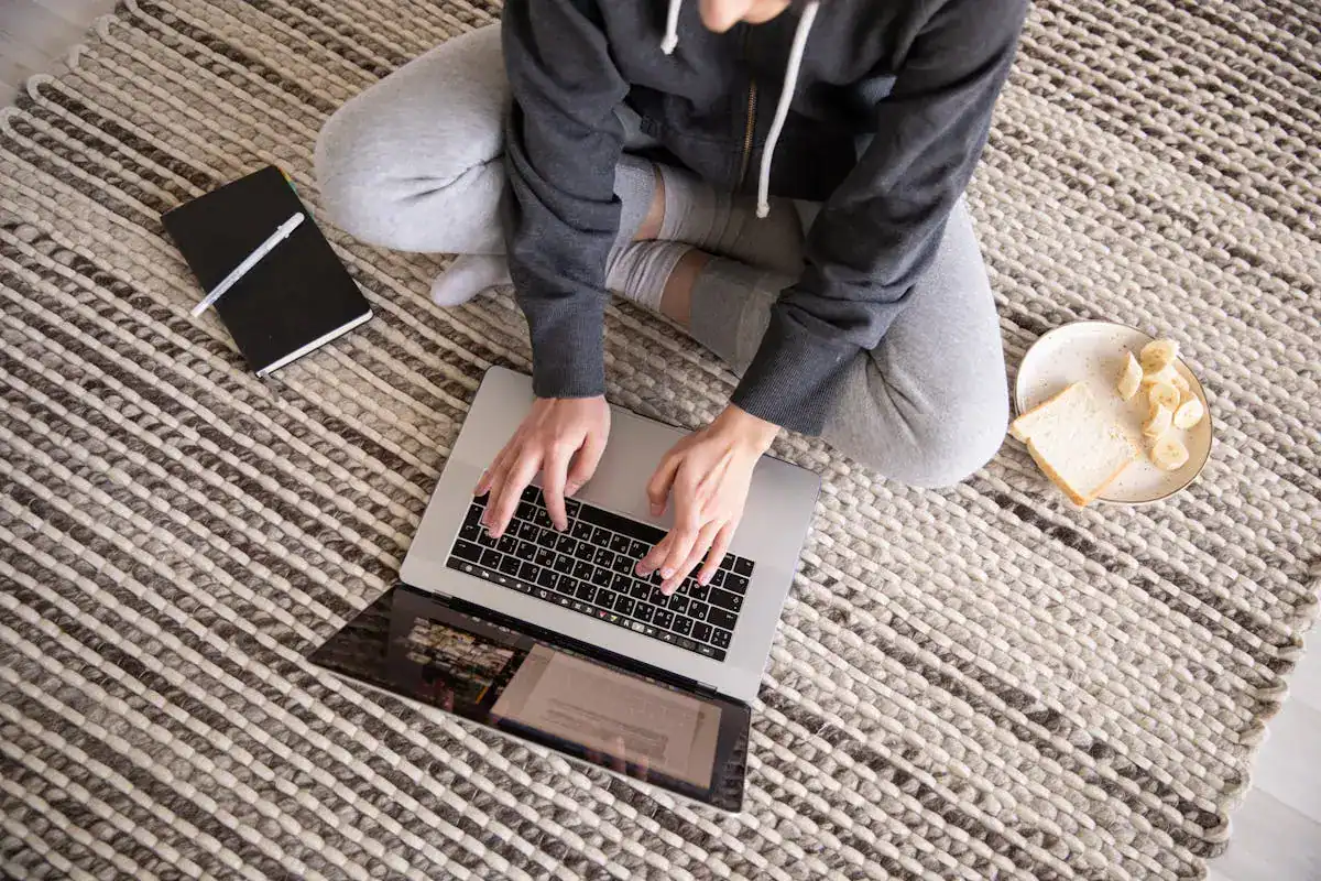 Woman sitting criss cross applesauce